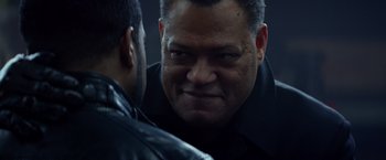 Movie still from “Ride Along” (2014), directed by Tim Story – A man in a leather jacket looking at another man in a leather jacket; Close Up shot, Over the shoulder angle