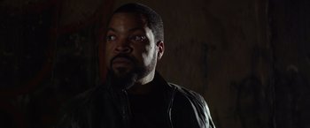 Movie still from “Ride Along” (2014), directed by Tim Story – A person wearing a jacket; Close Up shot, Over the shoulder angle