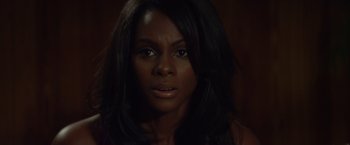 Movie still from “Ride Along” (2014), directed by Tim Story – A person with long black hair; Close Up shot, Over the shoulder angle