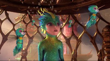 Movie still from “Rise of the Guardians” (2012), directed by Peter Ramsey – A green dragon is standing in front of a wooden structure; Medium shot, High angle