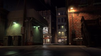Movie still from “Rise of the Guardians” (2012), directed by Peter Ramsey – An alley way with a building in the background at night time; Extreme Wide shot, High angle