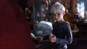 Movie still from “Rise of the Guardians” (2012), directed by Peter Ramsey – A young boy holding a hot dog in his hand; Medium shot, Over the shoulder angle