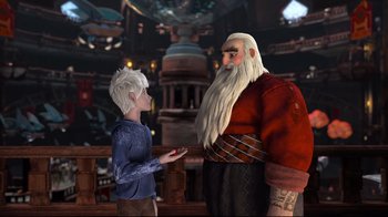 Movie still from “Rise of the Guardians” (2012), directed by Peter Ramsey – An animated scene of a man and a boy talking to each other; Medium shot, Over the shoulder angle