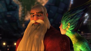 Movie still from “Rise of the Guardians” (2012), directed by Peter Ramsey – An old man with a long white beard is looking at a green creature; Close Up shot, Over the shoulder angle
