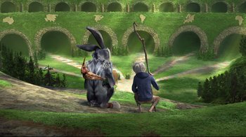 Movie still from “Rise of the Guardians” (2012), directed by Peter Ramsey – A man kneeling down next to an animal with an arrow; Wide shot, High angle