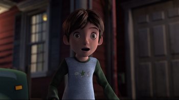 Movie still from “Rise of the Guardians” (2012), directed by Peter Ramsey – A boy is standing in front of a building; Medium shot, Over the shoulder angle