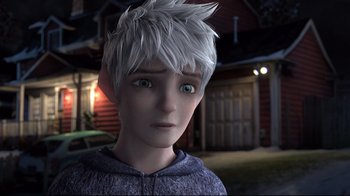Movie still from “Rise of the Guardians” (2012), directed by Peter Ramsey – A boy with white hair and blue eyes looking into the distance; Close Up shot, Over the shoulder angle