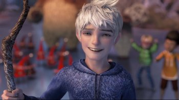 Movie still from “Rise of the Guardians” (2012), directed by Peter Ramsey – A young boy is smiling for the camera; Close Up shot, Over the shoulder angle