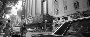 Movie still from “Roma” (2018), directed by Alfonso Cuarón – A black - and - white photo of a movie theater; Extreme Wide shot, Low angle