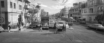 Movie still from “Roma” (2018), directed by Alfonso Cuarón – An old photo of a busy street with cars and pedestrians; Extreme Wide shot, High angle