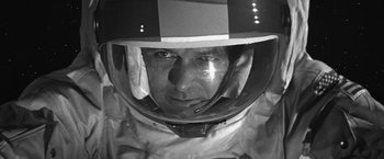 Movie still from “Roma” (2018), directed by Alfonso Cuarón – Black and white photograph of a man wearing a helmet; Close Up shot, Overhead angle