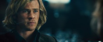 Movie still from “Rush” (2013), directed by Ron Howard – A person with long blonde hair; Close Up shot, Over the shoulder angle