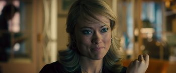 Movie still from “Rush” (2013), directed by Ron Howard – A person wearing a black shirt; Close Up shot, Over the shoulder angle