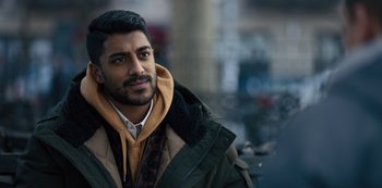 Movie still from “Russian Doll” (2019), created by Natasha Lyonne – A person wearing a jacket; Close Up shot, Over the shoulder angle