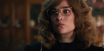 Movie still from “Russian Doll” (2019), created by Natasha Lyonne – A person wearing glasses; Close Up shot, Over the shoulder angle