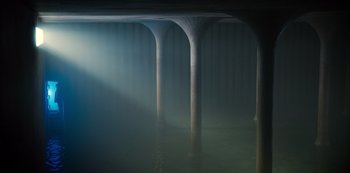 Movie still from “Russian Doll” (2019), created by Natasha Lyonne – A view of some pillars in the middle of a body of water; Extreme Wide shot, Low angle
