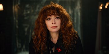 Movie still from “Russian Doll” (2019), created by Natasha Lyonne – A person with curly red hair; Close Up shot, High angle