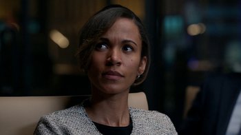 Movie still from “Salvation” (2017), created by Elizabeth Kruger – A person sitting in a chair; Close Up shot, Over the shoulder angle