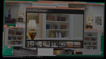 Movie still from “Salvation” (2017), created by Elizabeth Kruger – A computer screen with a picture of an oval office; Extreme Close Up shot, High angle