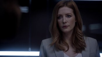 Movie still from “Salvation” (2017), created by Elizabeth Kruger – A person with long hair; Close Up shot, Over the shoulder angle