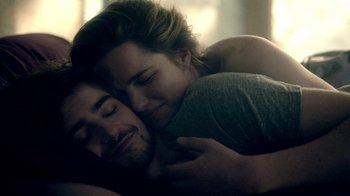 Movie still from “Salvation” (2017), created by Elizabeth Kruger – A man and a woman laying in bed together; Close Up shot, Over the shoulder angle