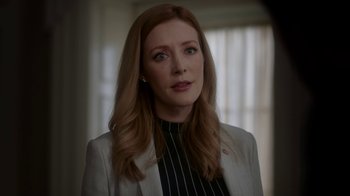 Movie still from “Salvation” (2017), created by Elizabeth Kruger – A person with long hair; Close Up shot, Over the shoulder angle