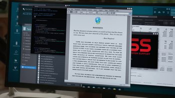 Movie still from “Salvation” (2017), created by Elizabeth Kruger – A computer screen with a computer screen with a computer screen on top of it; Extreme Close Up shot, Over the shoulder angle