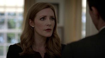 Movie still from “Salvation” (2017), created by Elizabeth Kruger – A person with long hair; Close Up shot, Over the shoulder angle