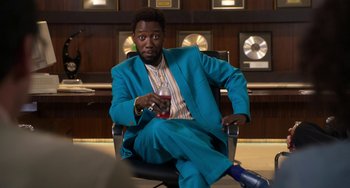 Movie still from “Sandy Wexler” (2017), directed by Steven Brill – Medium shot, Over the shoulder angle