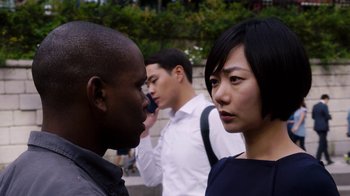 Movie still from “Sense8” (2015), directed by Tom Tykwer – A man and a woman talking to each other; Close Up shot, Over the shoulder angle