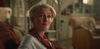 Movie still from “Sex Education” (2019), created by Laurie Nunn – A person wearing a neck tie; Close Up shot, Over the shoulder angle
