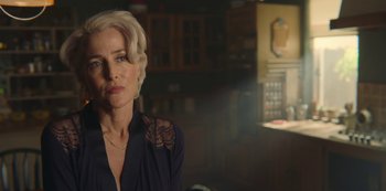 Movie still from “Sex Education” (2019), created by Laurie Nunn – A woman with short blonde hair wearing a black shirt; Close Up shot, Over the shoulder angle