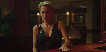 Movie still from “Sex Education” (2019), created by Laurie Nunn – A woman sitting at a table in front of a mirror; Medium shot, Over the shoulder angle