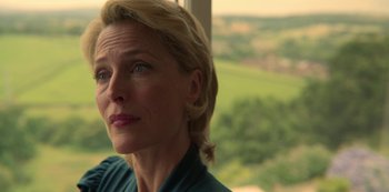 Movie still from “Sex Education” (2019), created by Laurie Nunn – A person looking out of a window; Close Up shot, Over the shoulder angle