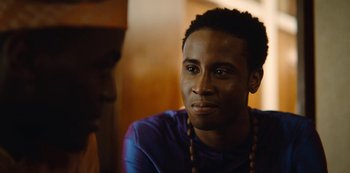 Movie still from “Sex Education” (2019), created by Laurie Nunn – A person wearing a blue shirt; Close Up shot, Over the shoulder angle