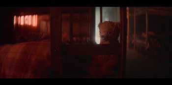 Movie still from “Sex Education” (2019), created by Laurie Nunn – A teddy bear sitting on top of a window sill; Extreme Close Up shot, Overhead angle