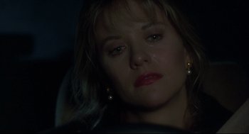 Movie still from “Sleepless in Seattle” (1993), directed by Nora Ephron – A person in a car crying; Close Up shot, Low angle