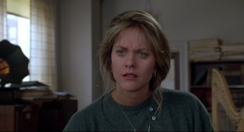 Movie still from “Sleepless in Seattle” (1993), directed by Nora Ephron – A person wearing a green shirt; Close Up shot, Over the shoulder angle