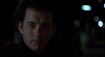 Movie still from “Sleepless in Seattle” (1993), directed by Nora Ephron – A man's face in the dark; Close Up shot, Low angle