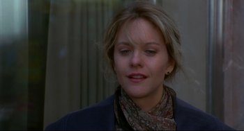 Movie still from “Sleepless in Seattle” (1993), directed by Nora Ephron – A person wearing a scarf; Close Up shot, Over the shoulder angle