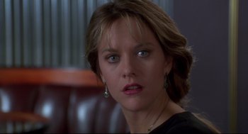 Movie still from “Sleepless in Seattle” (1993), directed by Nora Ephron – A person wearing a black shirt; Close Up shot, Low angle