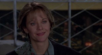 Movie still from “Sleepless in Seattle” (1993), directed by Nora Ephron – A person smiling for the camera; Close Up shot, Over the shoulder angle