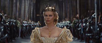 Movie still from “Snow White and the Huntsman” (2012), directed by Rupert Sanders – Charlize theron as the evil queen in the movie snow white and the seven dwarfs; Close Up shot, Low angle