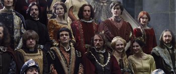 Movie still from “Snow White and the Huntsman” (2012), directed by Rupert Sanders – A group of men and women dressed in medieval clothing; Wide shot, High angle