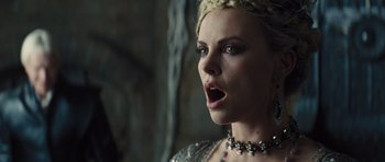 Movie still from “Snow White and the Huntsman” (2012), directed by Rupert Sanders – A person wearing a necklace; Close Up shot, Over the shoulder angle