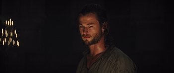 Movie still from “Snow White and the Huntsman” (2012), directed by Rupert Sanders – A person with long hair and a beard; Close Up shot, Low angle