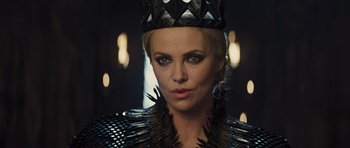 Movie still from “Snow White and the Huntsman” (2012), directed by Rupert Sanders – Charlize theron in the movie snow white and the huntsman; Close Up shot, Over the shoulder angle