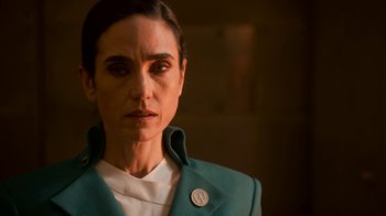 Movie still from “Snowpiercer” (2020), created by Graeme Manson – A person wearing a jacket; Close Up shot, Low angle