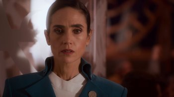 Movie still from “Snowpiercer” (2020), created by Graeme Manson – A person wearing a jacket; Close Up shot, Over the shoulder angle