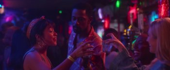 Movie still from “Someone Great” (2019), directed by Jennifer Kaytin Robinson – A man and a woman are talking to each other; Medium shot, Over the shoulder angle